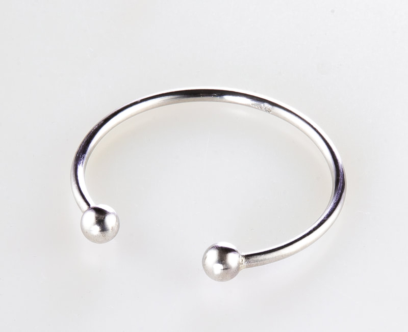 Women's Sterling Silver Torque Bracelet - a simple but elegant adjustable bracelet, an ideal wear for any season, a gift to remember