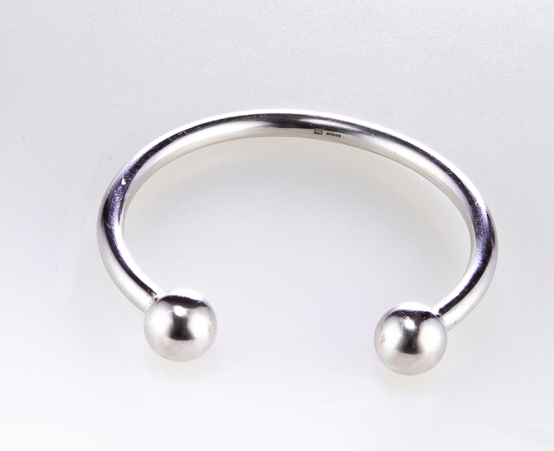 Men's Sterling Silver Torque Bangle - a simple round adjustable bracelet with silver balls at each end, an ideal gift for Christmas